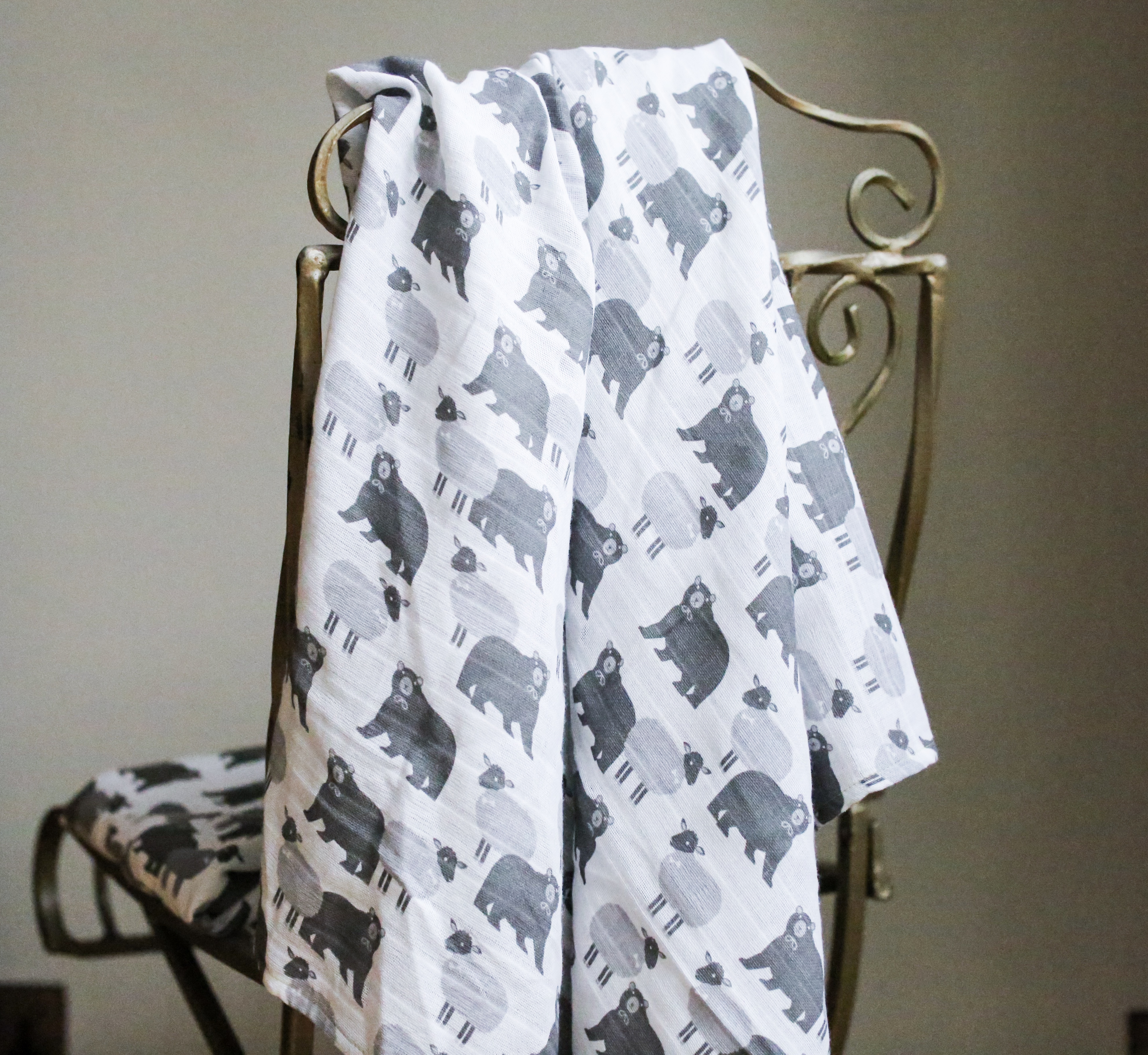 swaddle blanket over chair